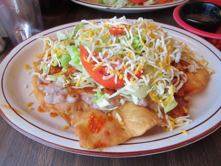 Sopapilla compuesta with red sauce